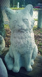 standing cat kitten concrete statue in tallahassee florida garden